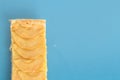 Top view of a piece of apple pie on a blue surface Royalty Free Stock Photo