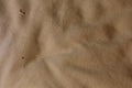 Top view of a piece of beige fabric - great for wallpapers