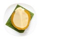 Top view of Piece of Pumpkin Custard is Thai dessert in white plate isolated on white background.