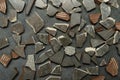 Top view of pieces of ceramic tiles on the grey surface as a background