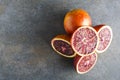 Top view of pile of blood orange and halves of it.Empty space for your design Royalty Free Stock Photo