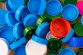 Top view of a pile of colorful plastic bottle caps Royalty Free Stock Photo