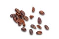 Top view pile of dry roasted cacao nibs isolated on white background