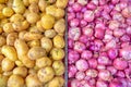 Top view pile of fresh white potatoes and red shallot onions at farmer market in Singapore Royalty Free Stock Photo