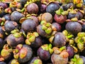 Top view Pile of Mangosteens in a supermarket local market in Thailand, Bunch of organic mangosteen