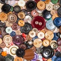 Top view of pile of many various buttons