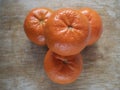 Top view on pile of three tangerine