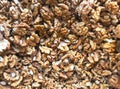 Top view of a pile of walnut kernels in a market