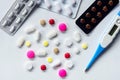 Top view of the pills on the white background, Pack of tablet drug and capsule pills on the floor, Royalty Free Stock Photo