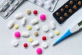 Top view of the pills on the white background, Pack of tablet drug and capsule pills on the floor, Royalty Free Stock Photo