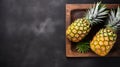 Top View Pineapple On Dark Gray Stone Plate - High Detail Stock Photo