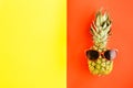 Top view pineapple sunglasses colorful background Flat lay Summer Background