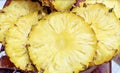 Top view of Pineapple yellow cut slices background
