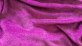 Top view of pink blanket with wrinkles