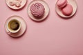 Top view of pink meringues, macaroons