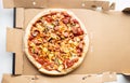 Top view pizza on brown box.Simple food and eating