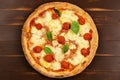 Top view of Pizza with tomato sauce, fresh mozzarella, Parmesan cheese and basil Royalty Free Stock Photo