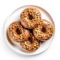 Top view of plate with caramel peanut donuts.