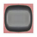 Plate on checkered tablecloth pattern background