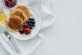 top view of plate of delicious pancakes with berries Royalty Free Stock Photo