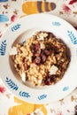 Top view of plate with orzotto with common morels and crunchy bacon Royalty Free Stock Photo