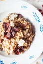 Top view of plate with orzotto with common morels and crunchy bacon Royalty Free Stock Photo