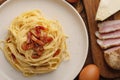 Top view plate spaghetti carbonara and ingredients Royalty Free Stock Photo