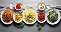 Top View Plates of pastas with different kinds of sauces. Generative AI Royalty Free Stock Photo