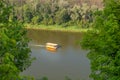 Top view of a pleasure tourist ship sailing along the river Royalty Free Stock Photo