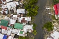 Top view of a poor shanty town by a small river. At an impoverished coastal area in the town of Ubay, Bohol. Example of urban