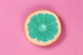 Top view popart grapefruit green color on a pink background