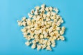 Top view popcorn on blue background