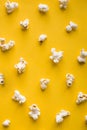 top view popcorn yellow background. High quality photo