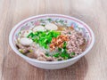 Top view of pork noodles meatball clear soup