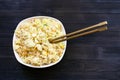 Top view of portion of Fried Rice with chopsticks