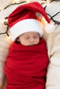 Top View Portrait First Days Of Life Newborn Cute Funny Sleeping Child Baby In Santa Hat Wrapped In Red Diaper At White Royalty Free Stock Photo