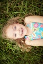 Top view portrait of a smiling shy little girl Royalty Free Stock Photo