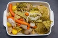 Top view of Pot-au-feu vegetables in a rectangular dish Royalty Free Stock Photo