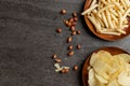 Top view of potato chips, french fries snack in dish and peanut Royalty Free Stock Photo