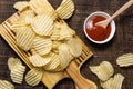 top view potato chips with ketchup. High quality photo