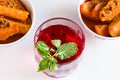 Top view of potato gravy or Dum Aloo an Indian curry and Sangria Kokum fruit punch with mint isolated on white background