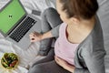 Top view of pregnant woman using computer Royalty Free Stock Photo