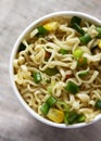 Top view, prepared instant ramen noodles with beef flavoring in a cup. Flat lay, from above, overhead. Close-up Royalty Free Stock Photo