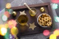 Cookies in a shape of stars,tea cup ,honey jar and golden christmas balls Royalty Free Stock Photo