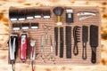 Top view of professional barber tools on wooden table