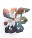 Top view.professional business team with their hands folded together