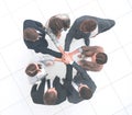 Top view.professional business team with their hands folded together