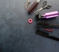 Top view of professional hair dresser tools on black concrete Royalty Free Stock Photo