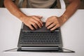 Top view of programmer hands typing complex code on laptop keyboard, revealing intense concentration during software Royalty Free Stock Photo