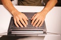 Top view of programmer hands typing on laptop keyboard, coding software, developing technology, working remotely Royalty Free Stock Photo